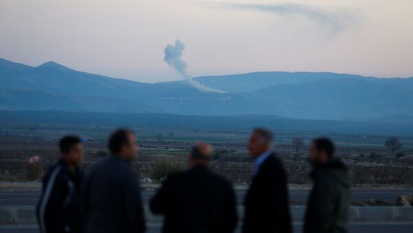 Smoke rises from the Syria's Afrin region, as it is pictured from near the Turkish town of Hassa, on the Turkish-Syrian border in Hatay province, Turkey January 20, 2018 - Sputnik Moldova