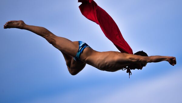 Михал Навратил (Чехия) после соревнований по прыжкам в воду с вышки 27 м на XVI чемпионате мира по водным видам спорта в Казани. - Sputnik Молдова