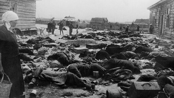 Советские граждане, расстрелянные фашистами в концлагере в Борисове перед отступлением. - Sputnik Молдова