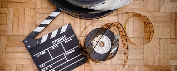 Кинопленка и кинохлопушка - Sputnik Молдова