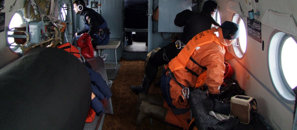 Сотрудники МЧС осуществляют поиск рыболовецкого судна Восток в Японском море Сотрудники МЧС осуществляют поиск рыболовецкого судна Восток в Японском море - Sputnik Молдова