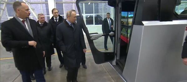 Путин собрал урожай на симуляторе комбайна в Ростове-на-Дону Путин собрал урожай на симуляторе комбайна в Ростове-на-Дону - Sputnik Молдова