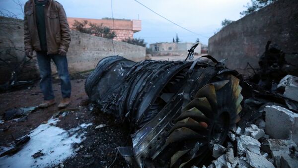 Обломки сбитого боевиками российского самолёта Су-25 в Сирии. 3 февраля 2018 - Sputnik Молдова