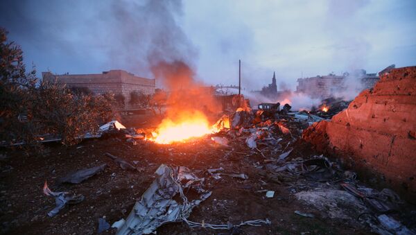 Обломки сбитого боевиками российского самолёта Су-25 в Сирии. 3 февраля 2018 - Sputnik Moldova-România
