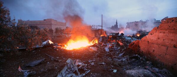 Обломки сбитого боевиками российского самолёта Су-25 в Сирии. 3 февраля 2018 Обломки сбитого боевиками российского самолёта Су-25 в Сирии. 3 февраля 2018 - Sputnik Moldova-România