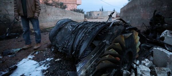 Обломки сбитого боевиками российского самолёта Су-25 в Сирии. 3 февраля 2018 - Sputnik Moldova-România