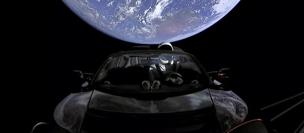 Автомобиль Tesla на орбите Автомобиль Tesla на орбите - Sputnik Молдова