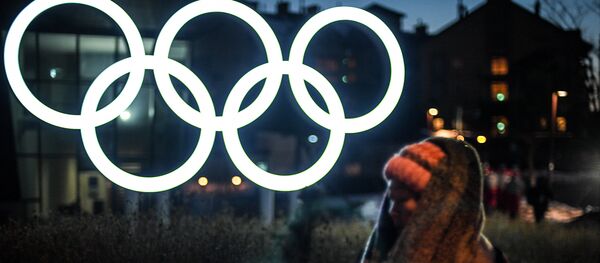 Олимпийские кольца в Олимпийском парке в Пхенчхане Олимпийские кольца в Олимпийском парке в Пхенчхане - Sputnik Молдова