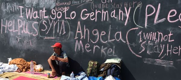 Беженцы с Ближнего Востока на вокзале Келети в Будапеште - Sputnik Moldova