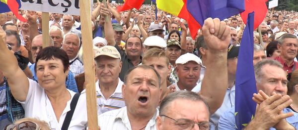 Антиправительственный митинг в центре Кишинева Антиправительственный митинг в центре Кишинева - Sputnik Молдова