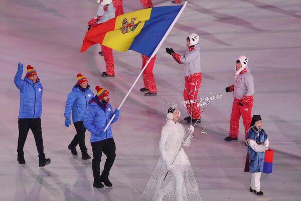 Nicolae Gaiduc poartă drapelul RM la ceremonia de inaugurare a JO Nicolae Gaiduc poartă drapelul RM la ceremonia de inaugurare a JO - Sputnik Moldova-România