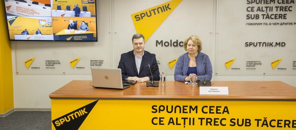 Евгений Паскарь и Лариса Катринич Евгений Паскарь и Лариса Катринич - Sputnik Молдова