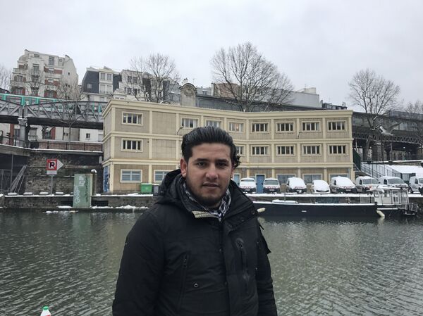 Мигрант Джан в Париже Мигрант Джан в Париже - Sputnik Молдова