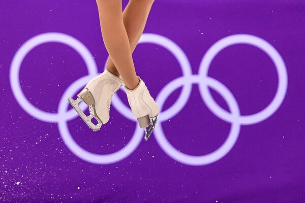 Кэйтлин Осмонд (Канада) выступает в короткой программе женского одиночного катания командных соревнований по фигурному катанию на XXIII зимних Олимпийских играх в Пхенчхане - Sputnik Молдова