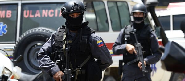 Сотрудники венесуэльской полиции. Архивное фото Сотрудники венесуэльской полиции. Архивное фото - Sputnik Молдова