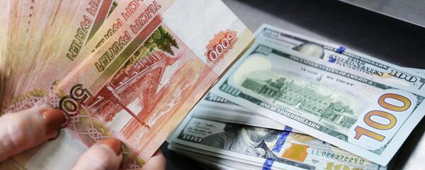 US dollars and rubles inside a currency exchange office of a Sberbank - Sputnik Moldova