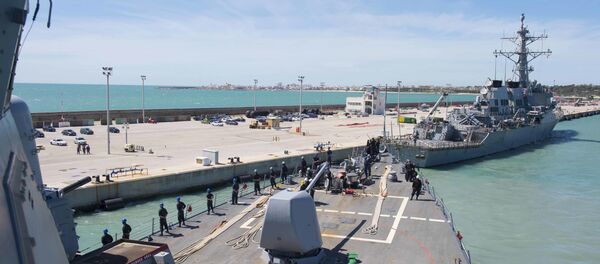 In this photo provided by the U.S. Navy, the Arleigh Burke-class guided-missile destroyer USS Ross (DDG 71) departs Rota, Spain, on March 29, 2017. - Sputnik Moldova-România