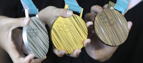 Олимпийские медали Пченчхан-2018 - Sputnik Молдова