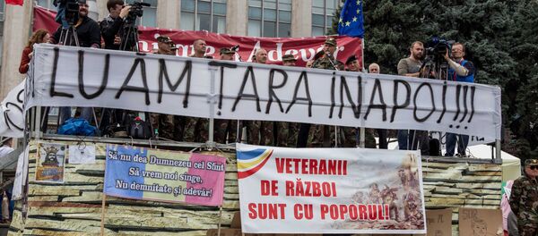 Один из активистов платформы DA Василий Нэстасе повторил требования по отставке руководства страны. - Sputnik Moldova