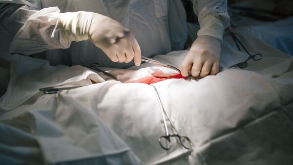 Хирургическая операция в больнице - Sputnik Moldova