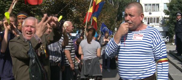 Акция протеста состоялась у здания генпрокуратуры в Кишиневе Акция протеста состоялась у здания генпрокуратуры в Кишиневе - Sputnik Молдова