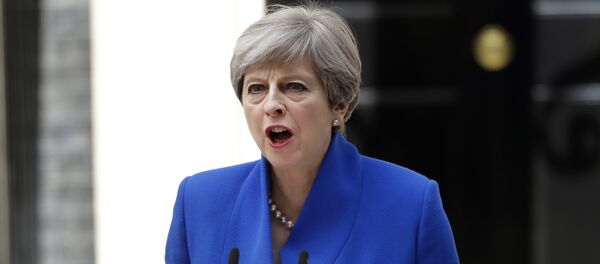 British Prime Minister Theresa May addresses the press in Downing street, London, Friday, June 9, 2017 following an audience with Britain's Queen Elizabeth II at Buckingham Palace where she asked to form a government. - Sputnik Moldova-România