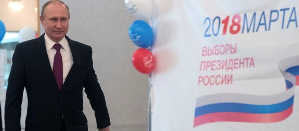 Президент РФ В. Путин принял участие в голосовании на выборах президента РФ - Sputnik Молдова