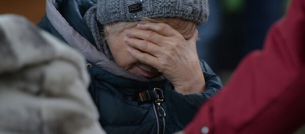 Родственница одного из пропавших без вести при пожаре в торговом центре «Зимняя вишня» в Кемерово - Sputnik Молдова