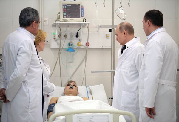 Президент РФ В. Путин почтил память погибших при пожаре в Кемерове Президент РФ В. Путин почтил память погибших при пожаре в Кемерове - Sputnik Moldova