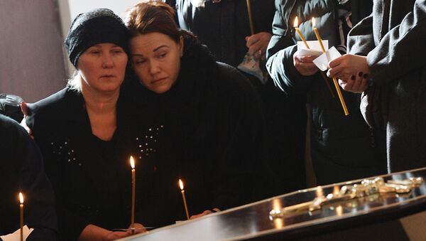 Прощание с погибшими при пожаре в торговом центре в Кемерово - Sputnik Moldova