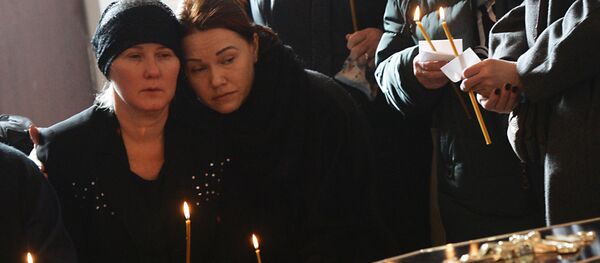 Прощание с погибшими при пожаре в торговом центре в Кемерово - Sputnik Moldova