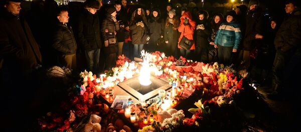 Акции в память о погибших при пожаре в ТЦ Зимняя вишня - Sputnik Молдова