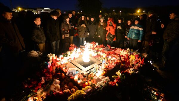 Акции в память о погибших при пожаре в ТЦ Зимняя вишня - Sputnik Молдова
