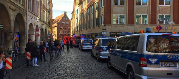 First responders work at the scene when several people were killed and injured when a car ploughed into pedestrians in Muenster, western Germany on April 7, 2018 - Sputnik Moldova-România