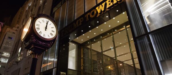 A clock sits outside of Trump Tower at midnight A clock sits outside of Trump Tower at midnight - Sputnik Moldova