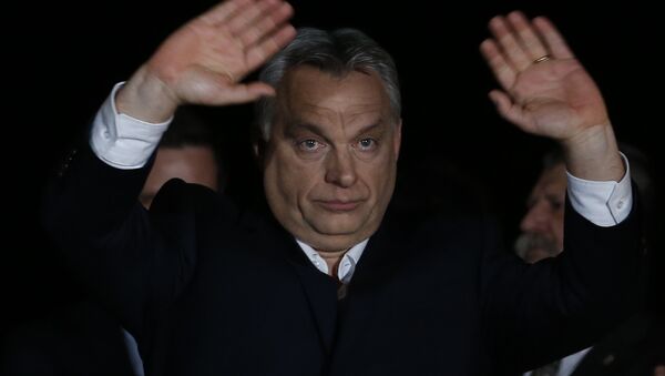 Hungarian Prime Minister Viktor Orban gestures in Budapest, Hungary, Sunday, April 8, 2018 - Sputnik Moldova-România