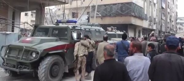 Российские военные проверили сирийский город Дума после сообщений о химической атаке Российские военные проверили сирийский город Дума после сообщений о химической атаке - Sputnik Молдова