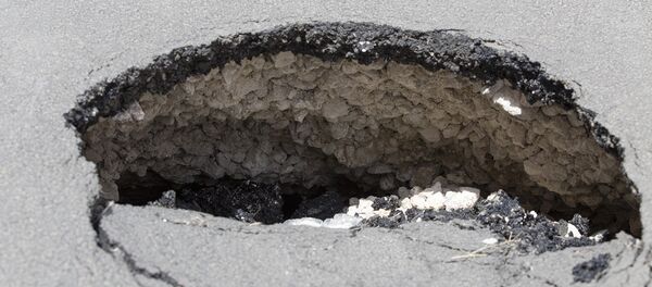 проседание асфальта ямы - Sputnik Moldova