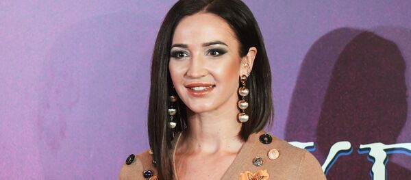 Телеведущая, певица Ольга Бузова Телеведущая, певица Ольга Бузова - Sputnik Moldova-România