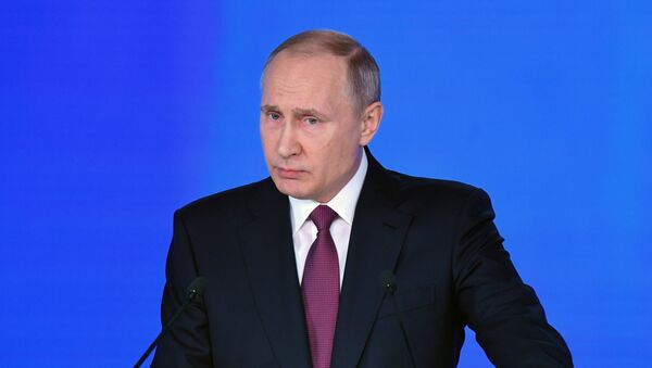 Russian President Vladimir Putin delivers his annual Presidential Address to the Federal Assembly at the Manezh Central Exhibition Hall - Sputnik Moldova-România