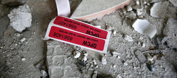 Labels of the Organisation for the Prohibition of Chemical Weapons (OPCW) are seen iside a damaged house in Douma in Damascus, Syria April 23, 2018 - Sputnik Moldova-România