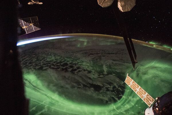 Полярное сияние на Земле, снятое с Международной космической станции - Sputnik Молдова