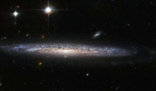 Галактики NGC 5714 и NGC 1787, снятые телескопом Хаббл - Sputnik Молдова
