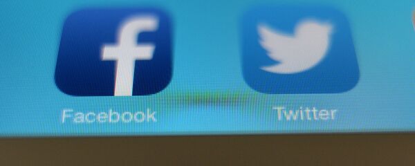 Twitter и Facebook. Архивное фото Twitter и Facebook. Архивное фото - Sputnik Молдова