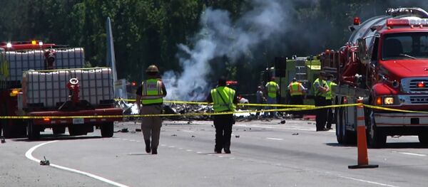 Кадры с места крушения транспортника C-130 в США Кадры с места крушения транспортника C-130 в США - Sputnik Молдова