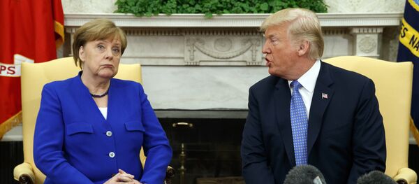 President Donald Trump meets with German Chancellor Angela Merkel in the Oval Office of the White House, Friday, April 27, 2018, in Washington - Sputnik Moldova