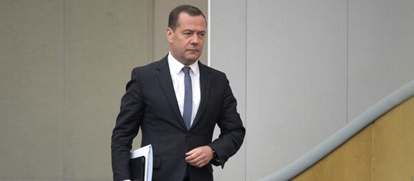 Президент РФ В. Путин и кандидат на пост премьер-министра РФ Д. Медведев приняли участие в пленарном заседании Госдумы РФ - Sputnik Молдова