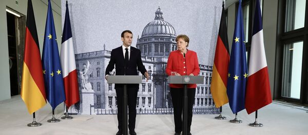 Angela Merkel și Emmanuel Macron Angela Merkel și Emmanuel Macron - Sputnik Moldova