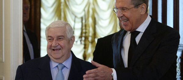 Министр иностранных дел РФ Сергей Лавров и глава МИД Сирии Валид Муаллем на встрече в Москве. Архивное фото - Sputnik Молдова
