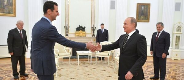 Президент России Владимир Путин и президент Сирии Башар Асад во время встречи в Кремле Президент России Владимир Путин и президент Сирии Башар Асад во время встречи в Кремле - Sputnik Moldova